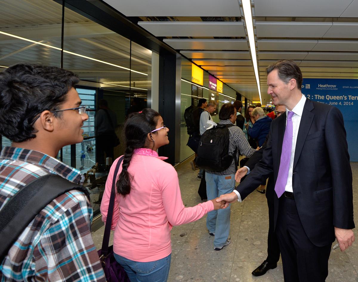 Download Image - Terminal 2 Development Director meets passengers picture