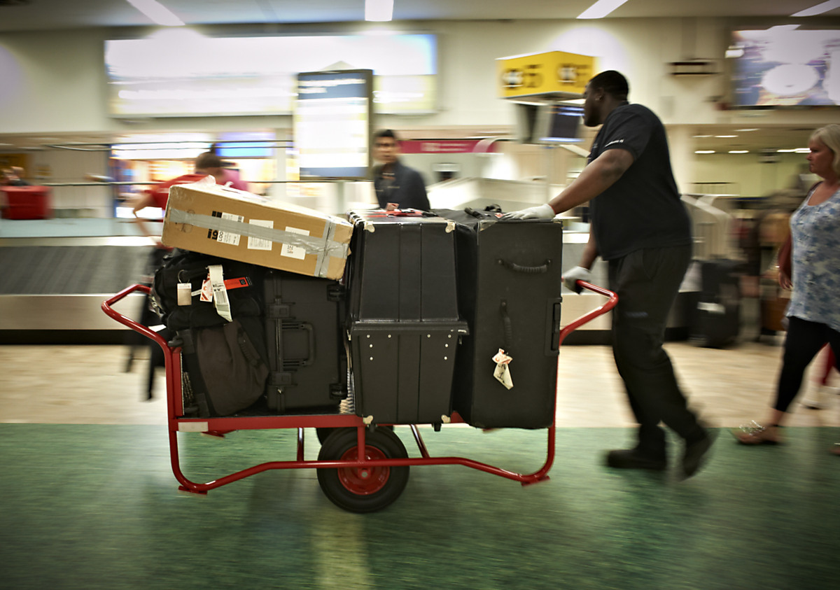 Download Image - Olympic Arrivals - baggage reclaim picture