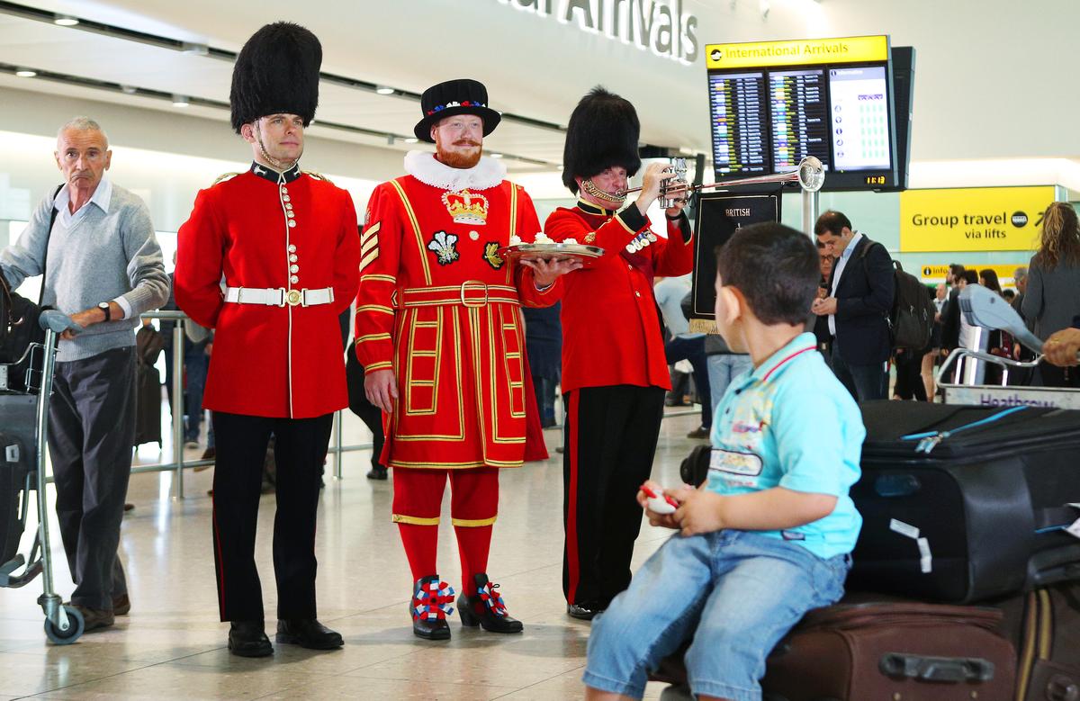 Download Image - Heathrow brings a taste of the royal wedding to arriving passengers picture