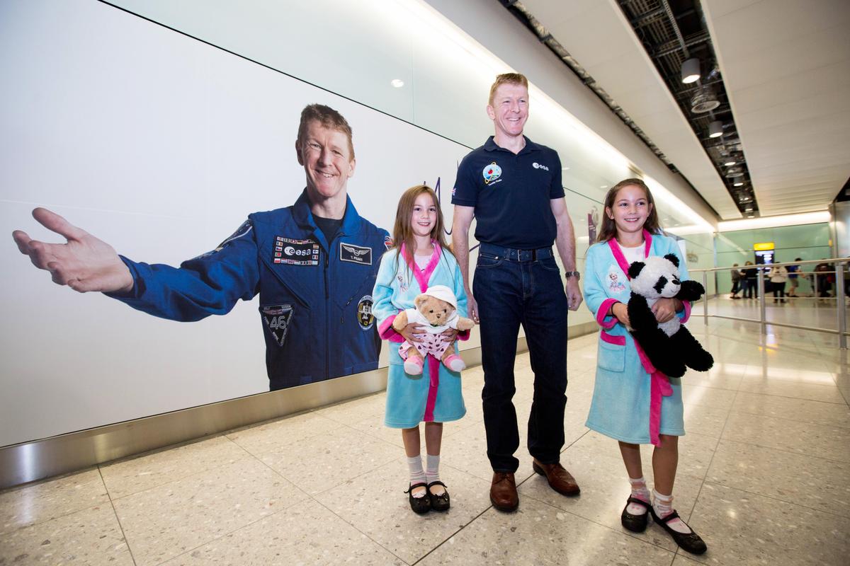 Download Image - Tim Peake lands at Heathrow picture