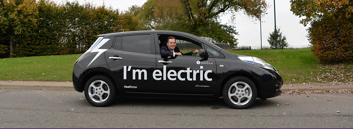 Download Image - Heathrow's CEO John Holland-Kaye in electric car picture