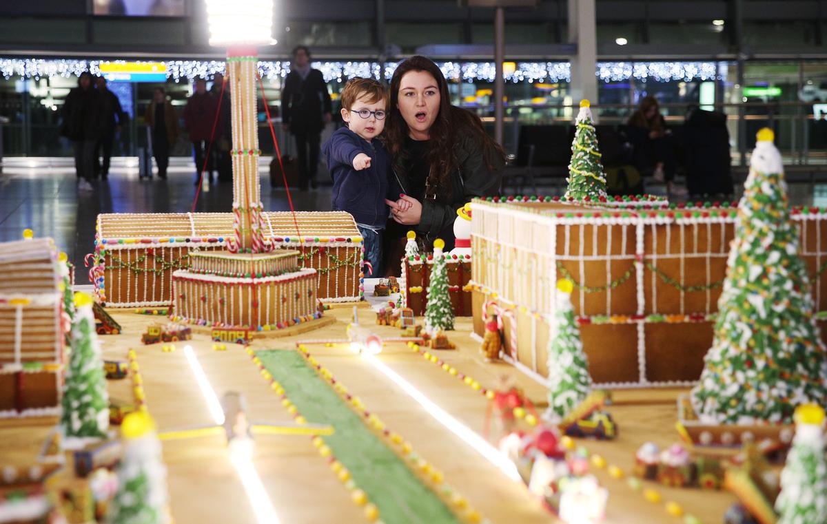 Download Image - Candice Brown unveils elaborate gingerbread model of Heathrow picture