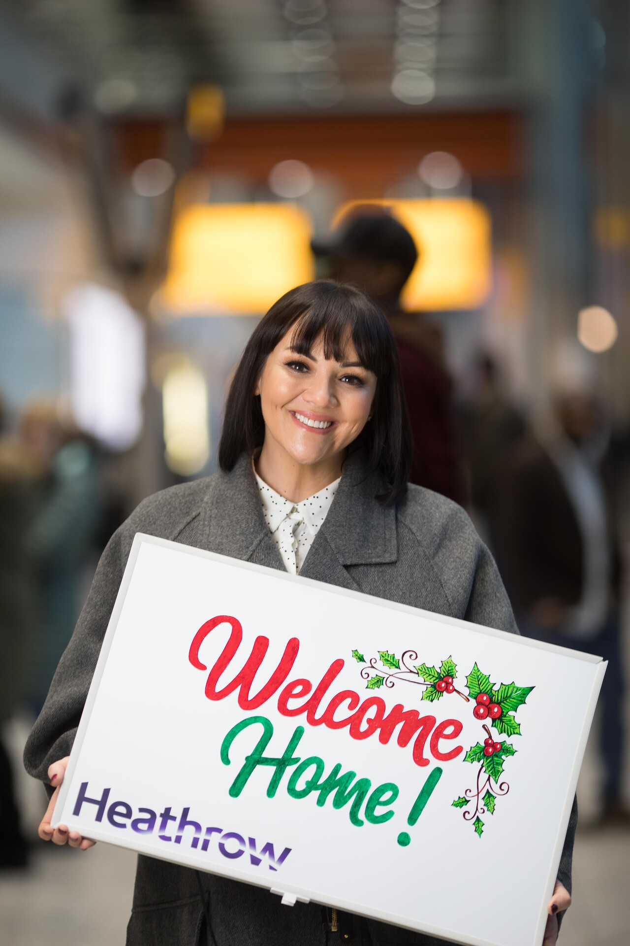Martine McCutcheon surprises passengers at Heathrow with a Love Actually moment picture