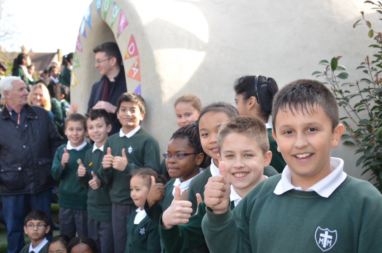 St. Michael and St. Martin Catholic Primary students celebrate adobe building